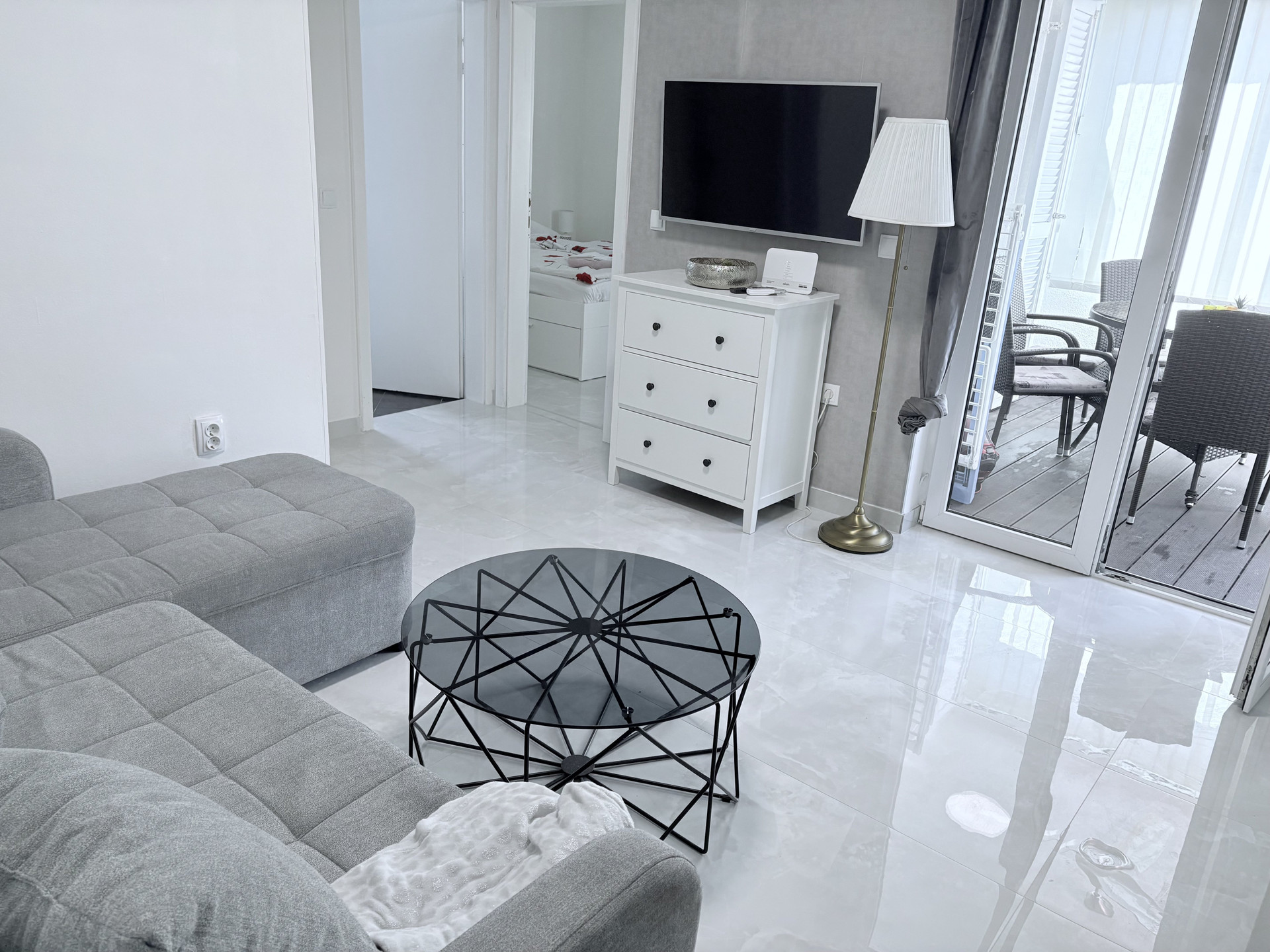 Bright living room with TV