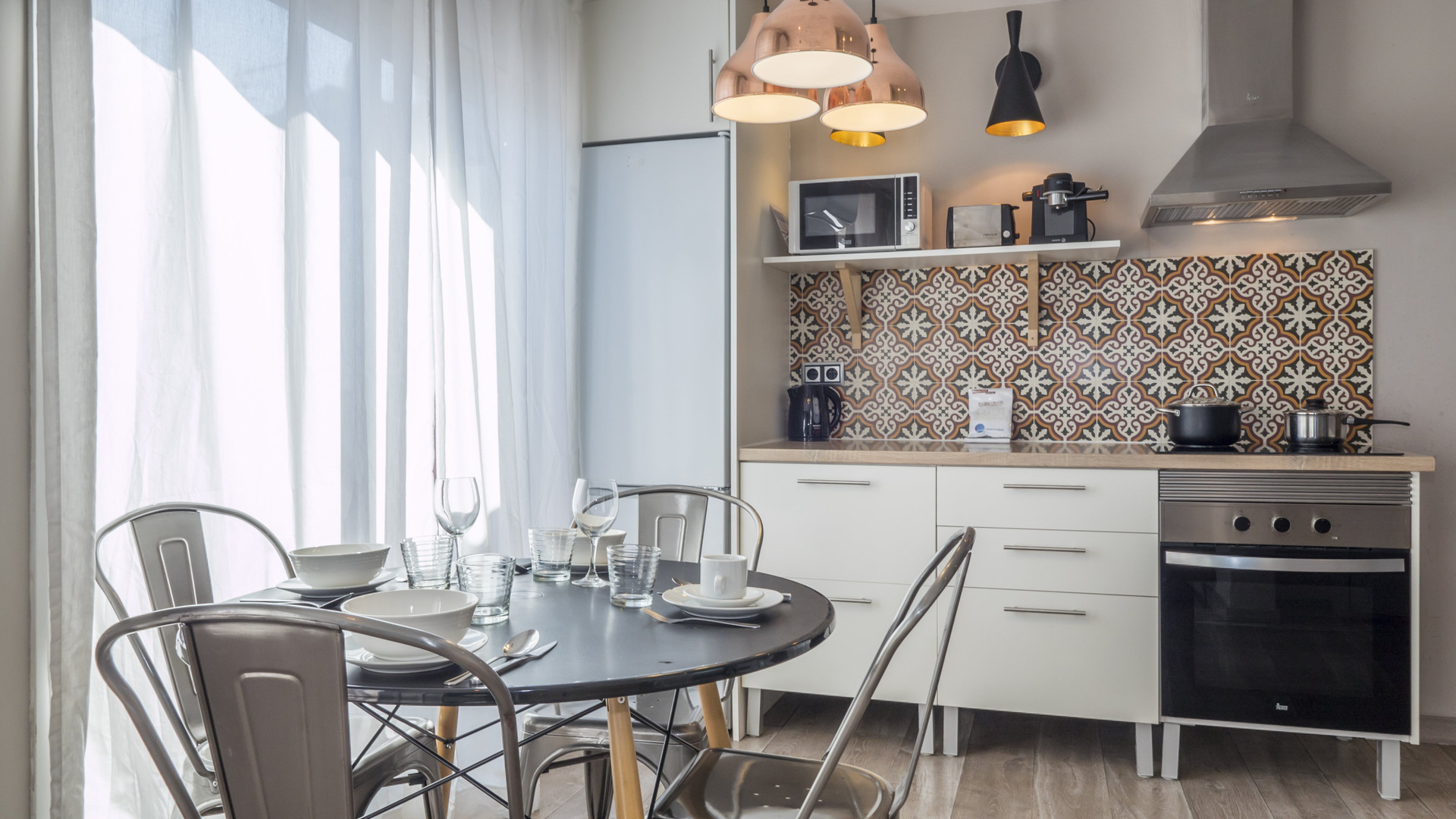 Kitchen dining area with pendant lights