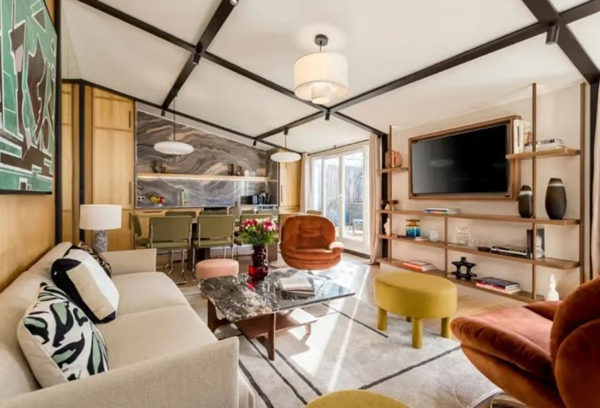 Living area with TV and kitchen