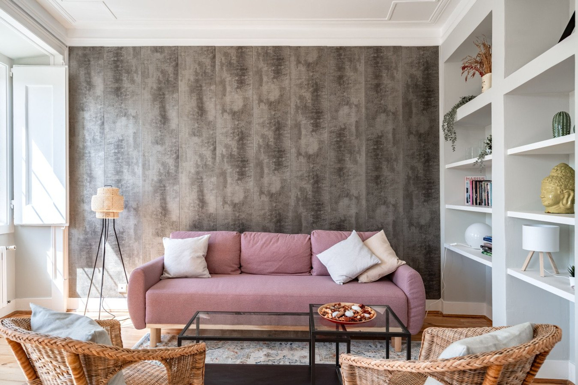 Cozy living room with pink sofa