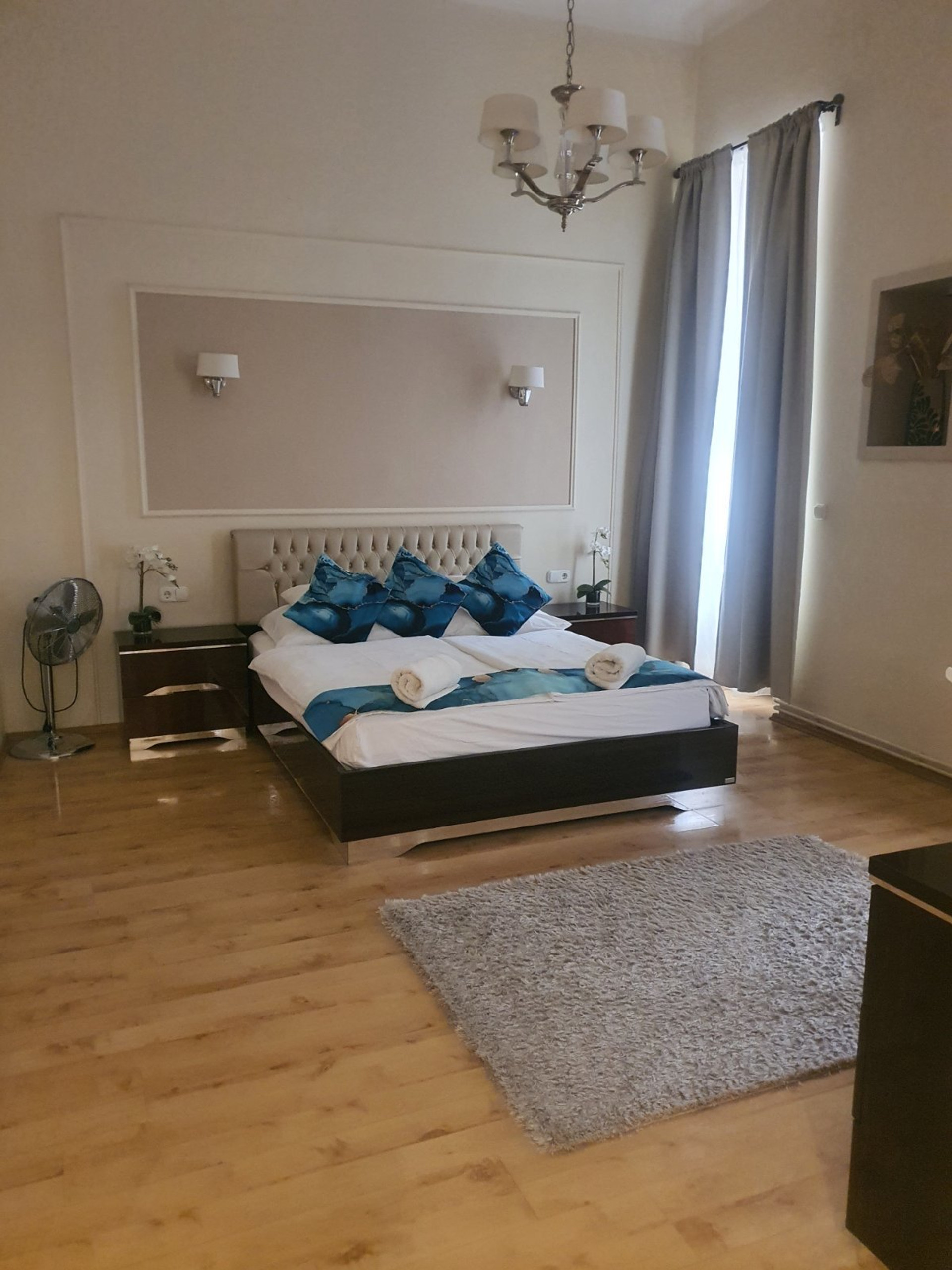 Elegant bedroom with double bed