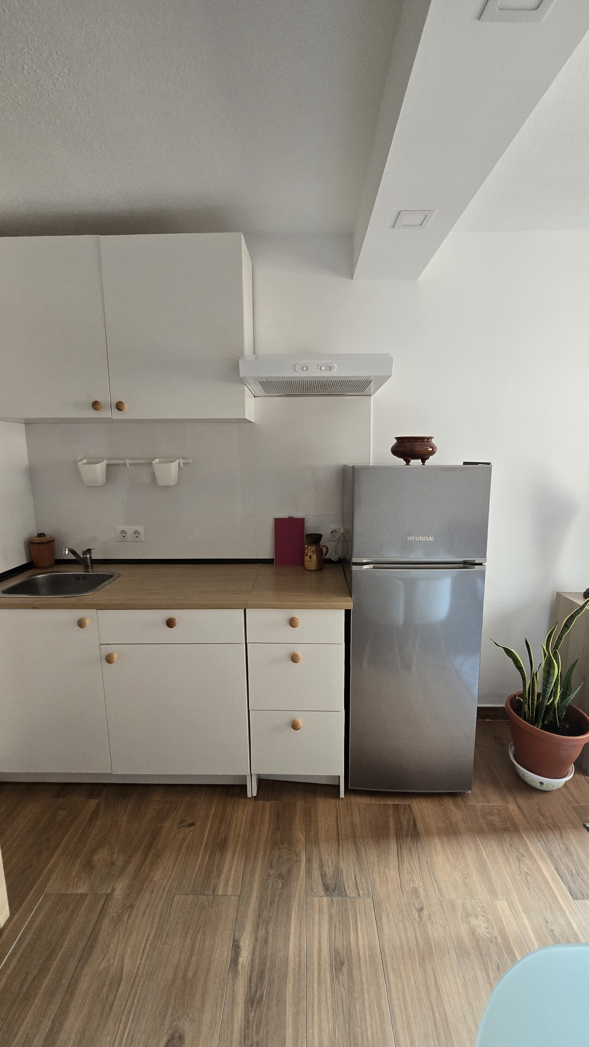 Kitchen with fridge and counter