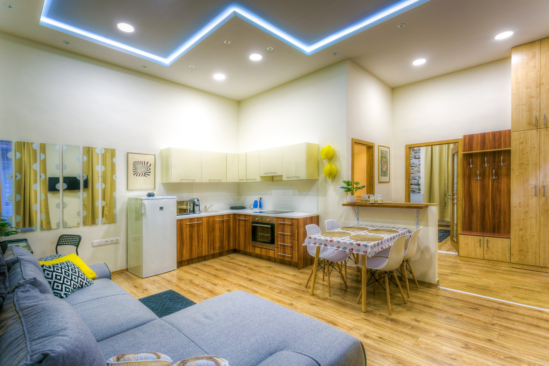 living room with kitchen and dining area