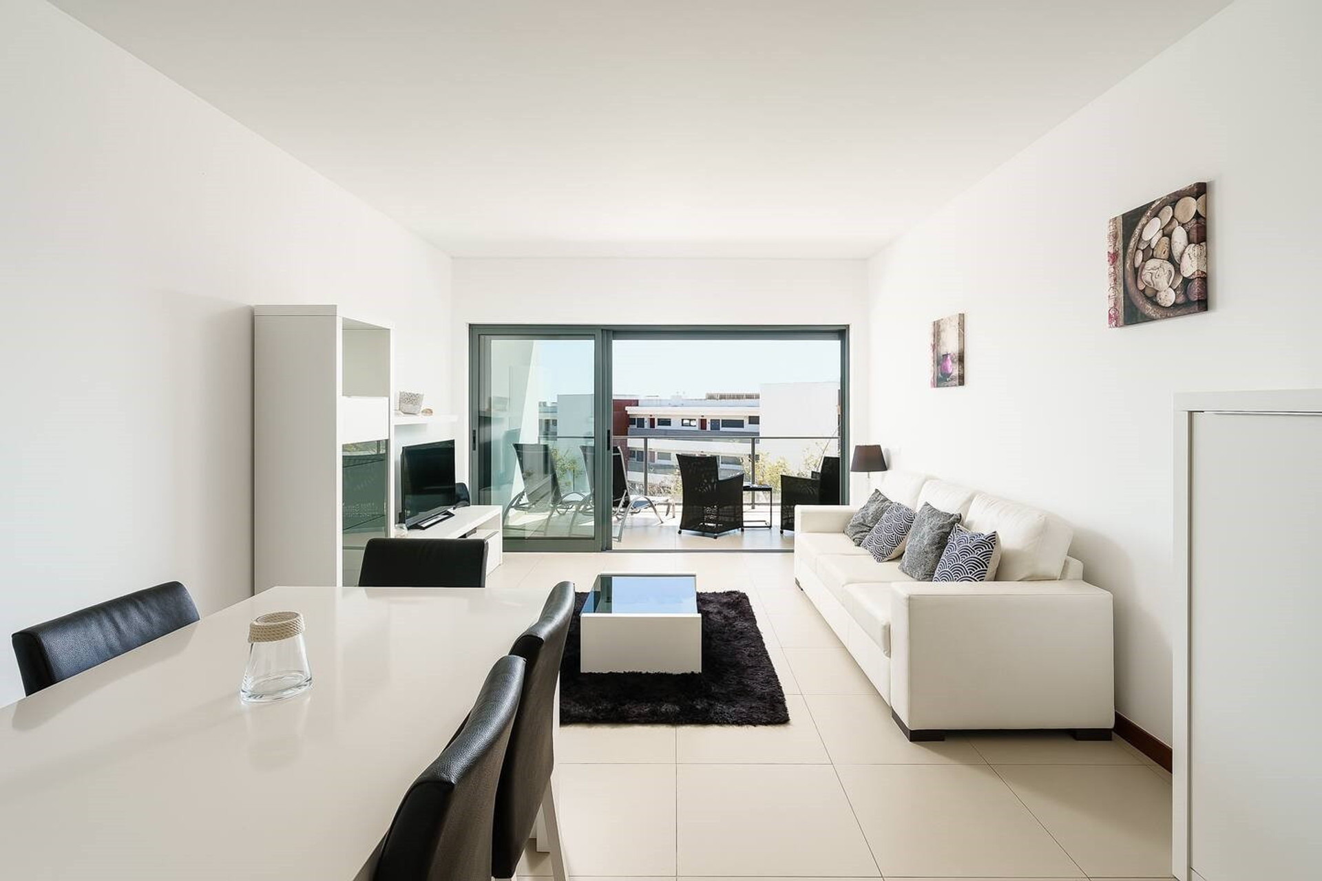 Bright living room with dining area