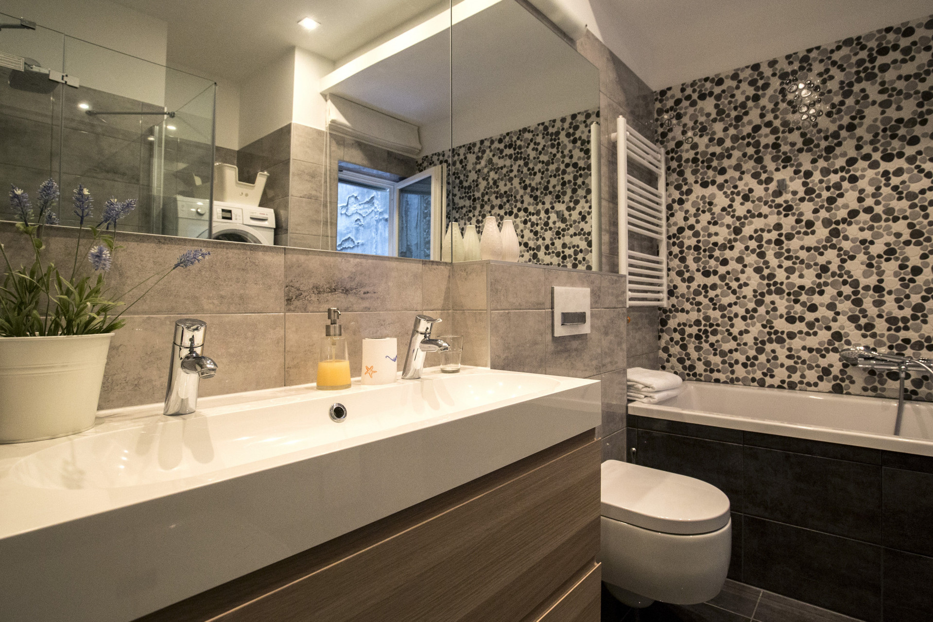 Cozy bathroom with bathtub and shower