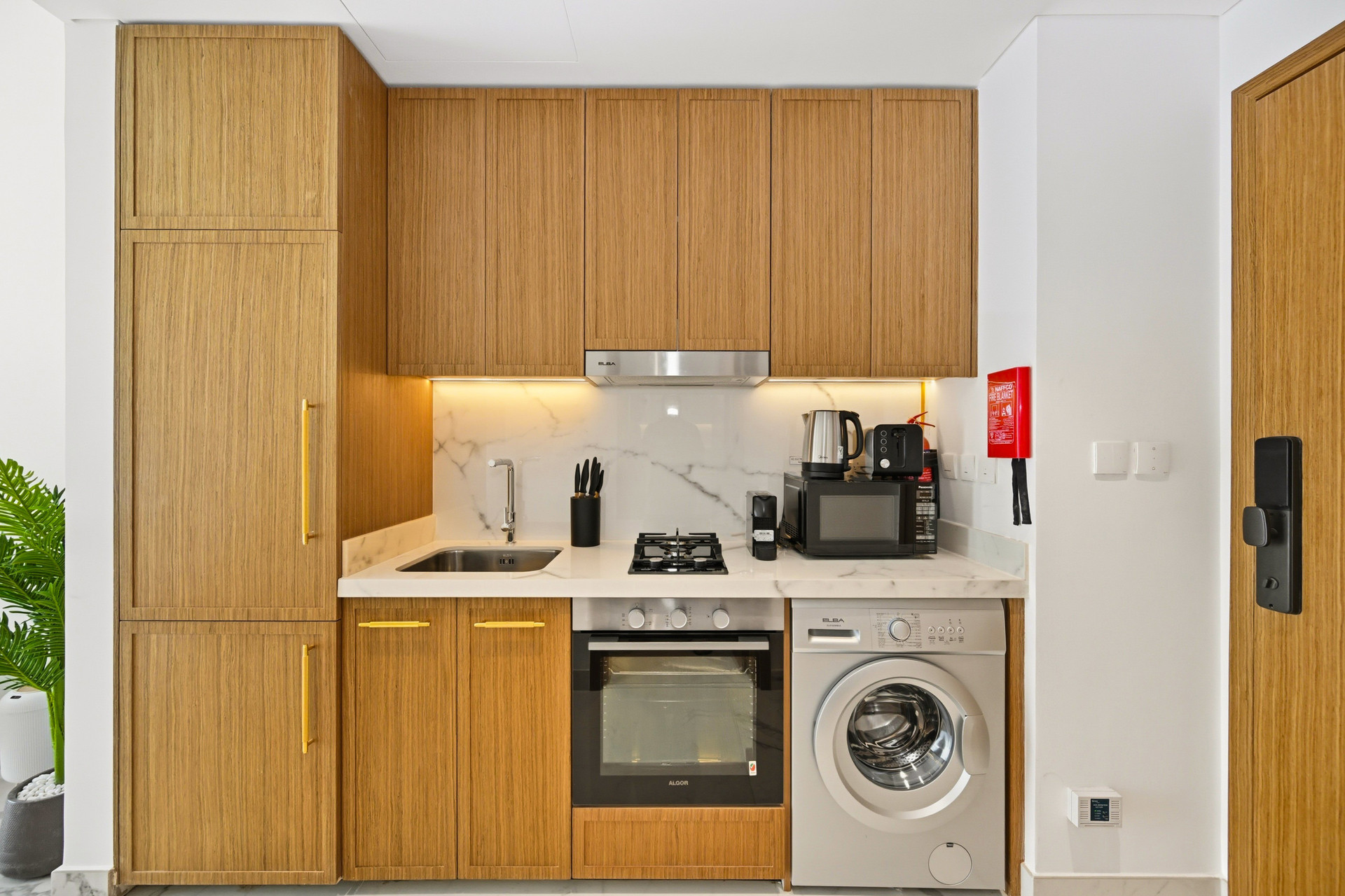 Compact kitchen with washer, appliances