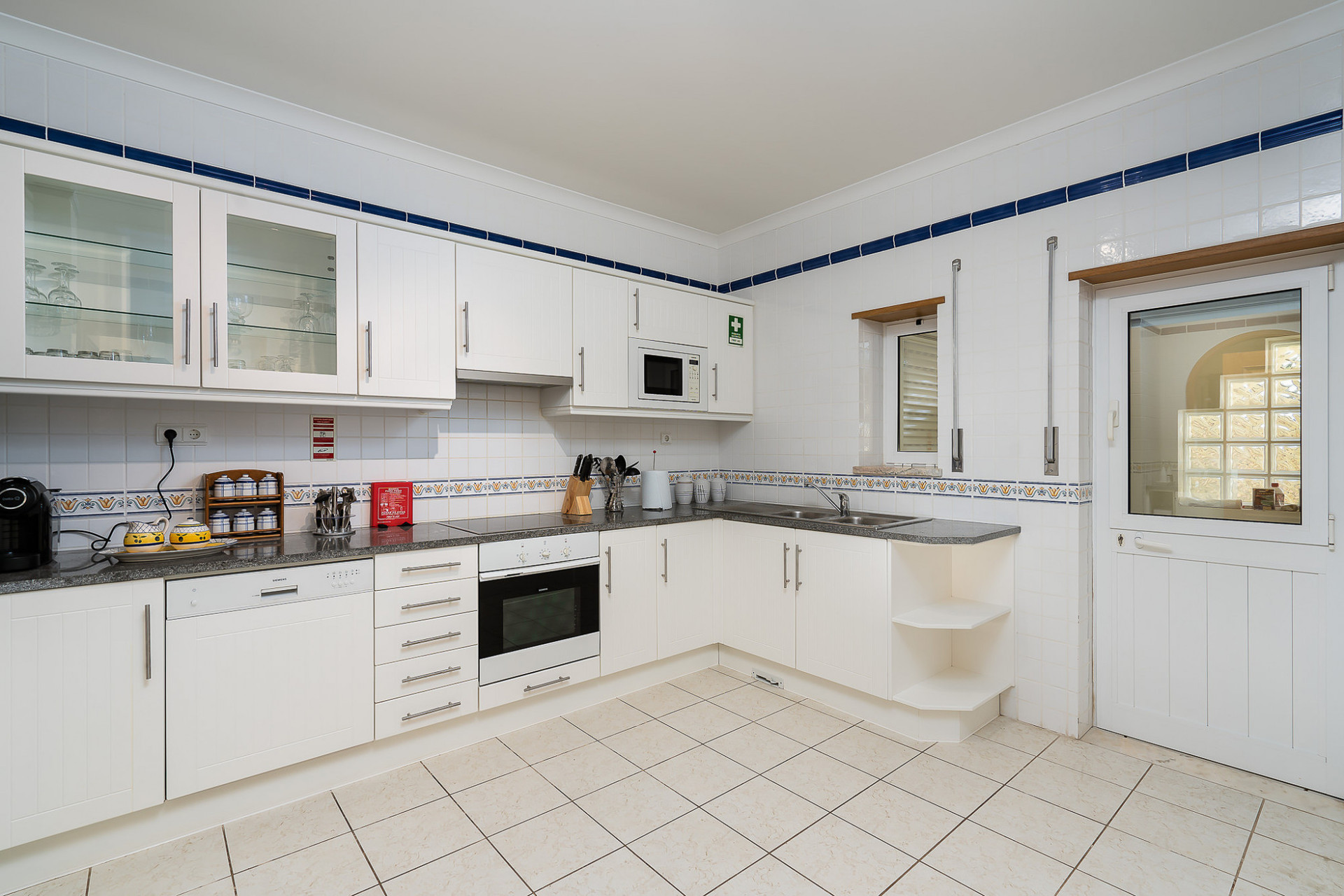 White kitchen with appliances