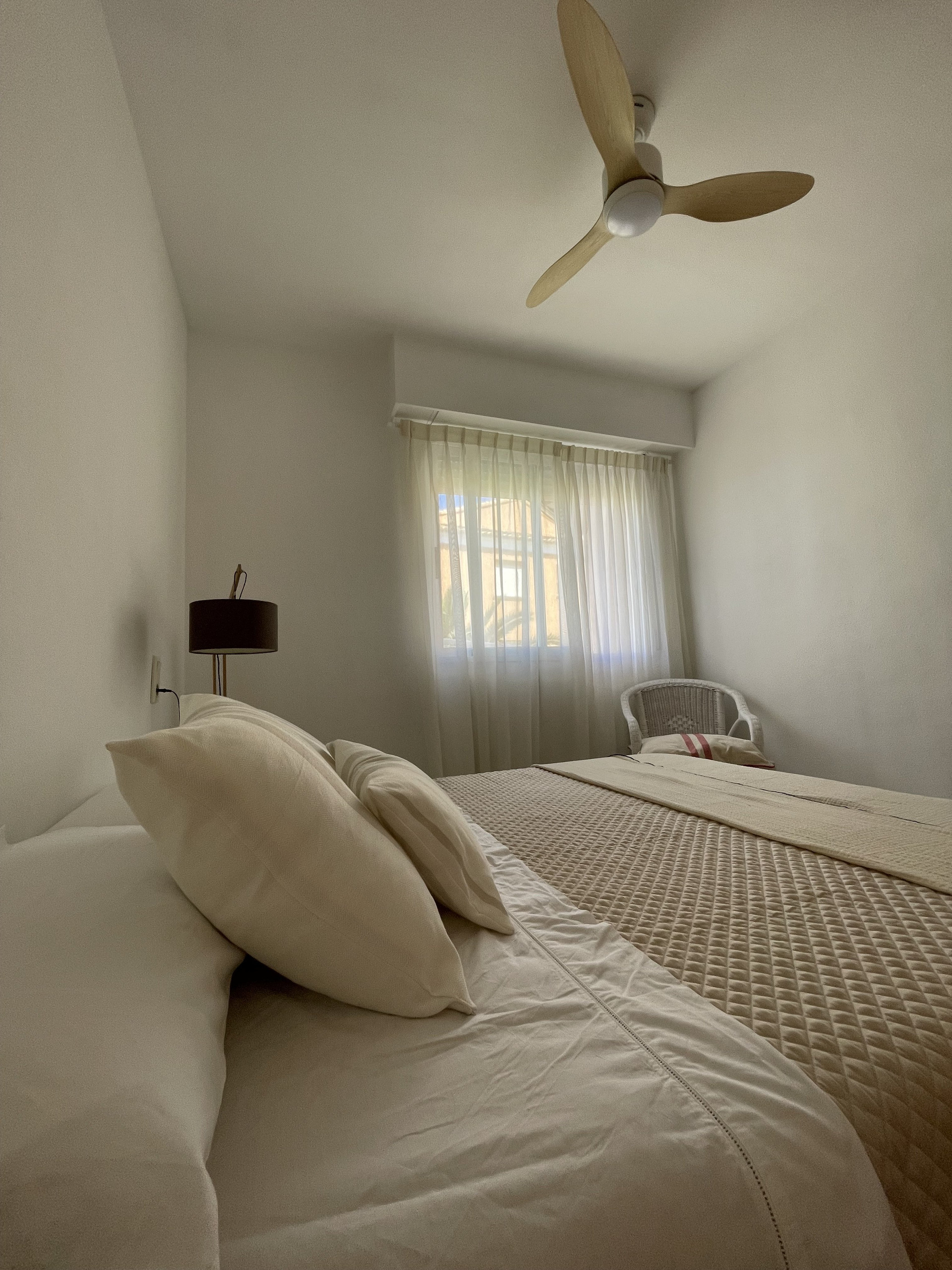 Master bedroom with ceiling fan