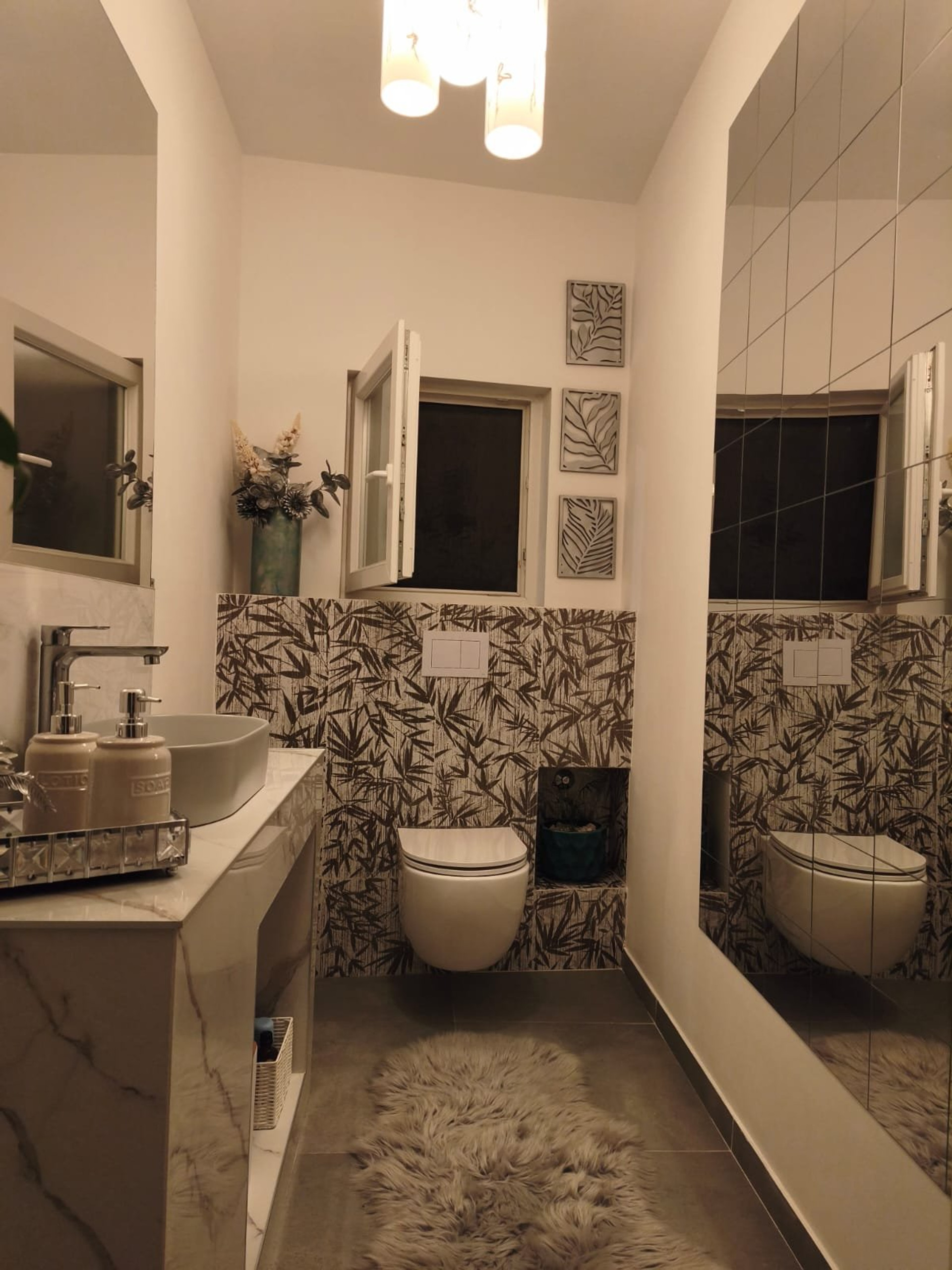 Stylish bathroom with patterned tiles