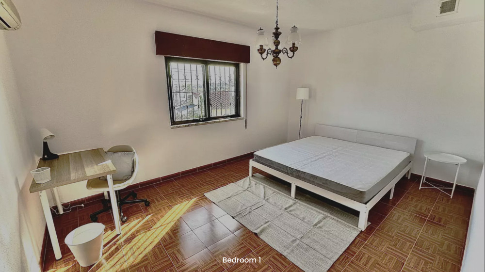 Room in a house with garden and barbecue
