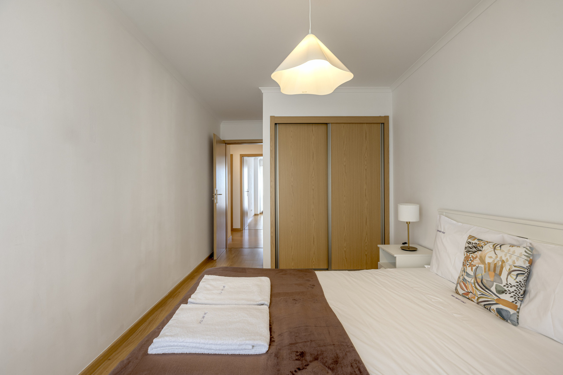 Bedroom with double bed and wardrobe