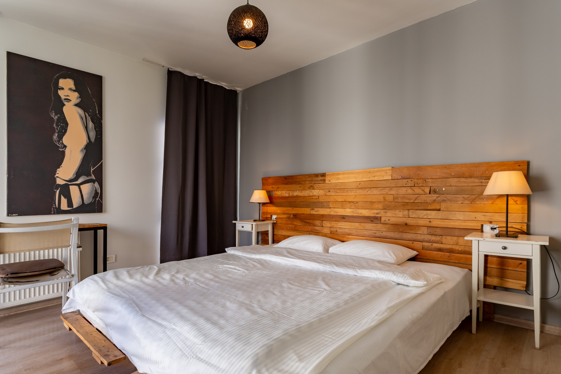 Second bedroom wood headboard lamps