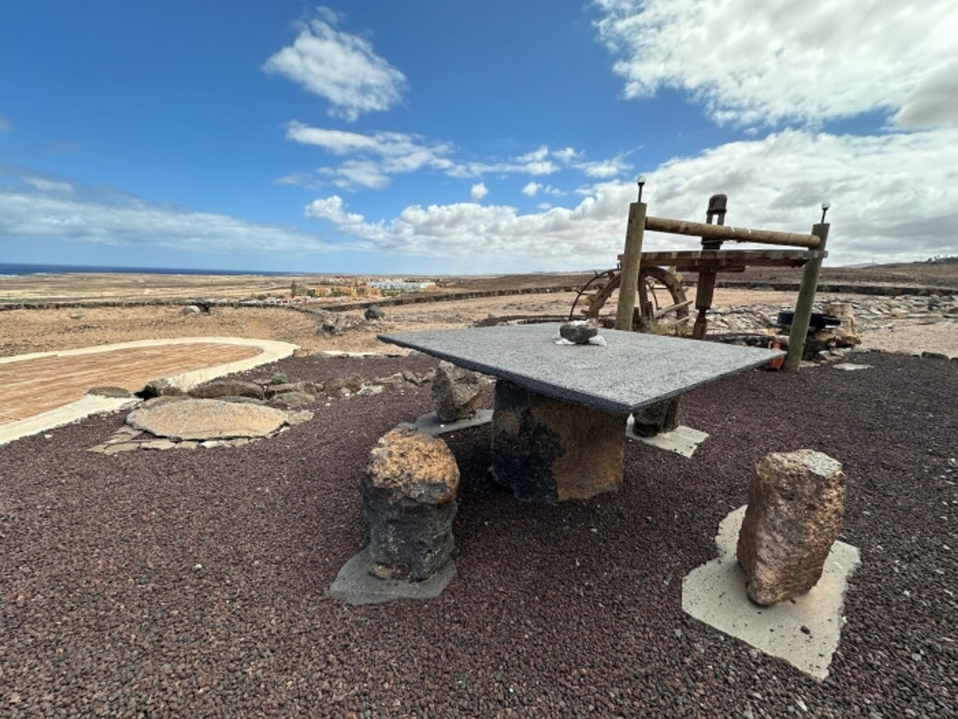 Outdoor stone table seating desert view