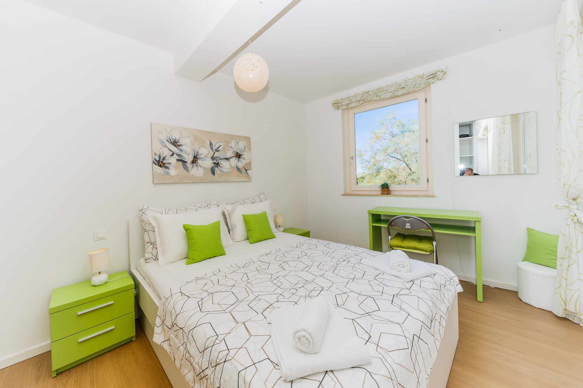 bedroom with balcony and beach view
