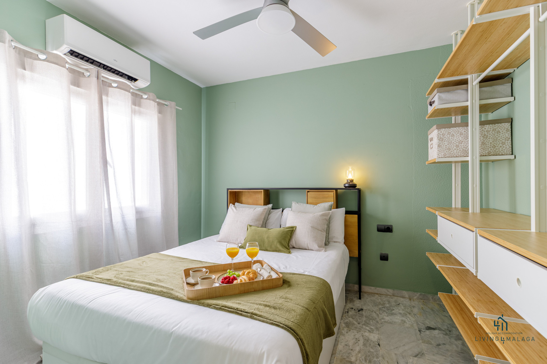 Green bedroom with breakfast tray