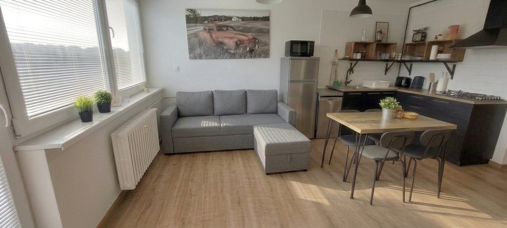 Living room with kitchen and dining