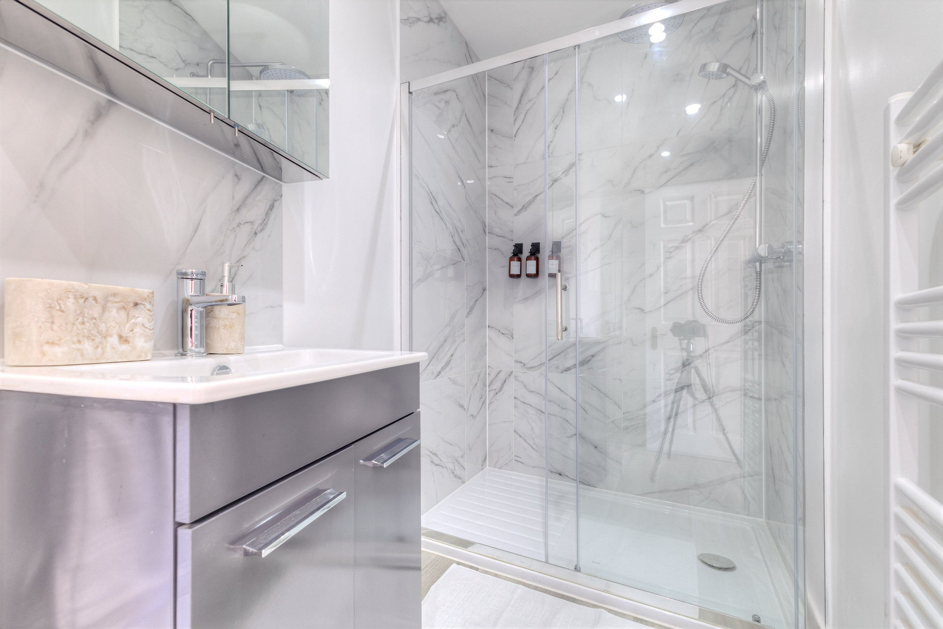 Marble bathroom with glass shower