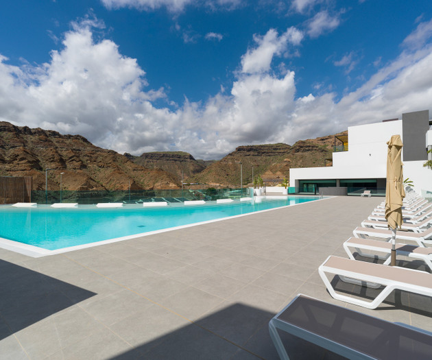 Infinity pool with clouds