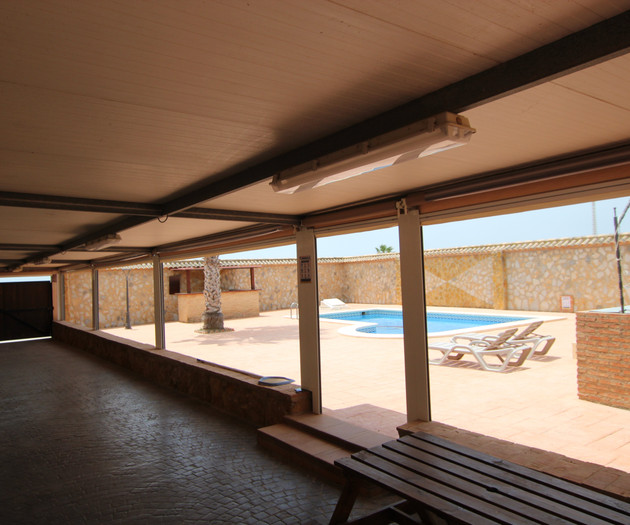 Covered terrace pool view