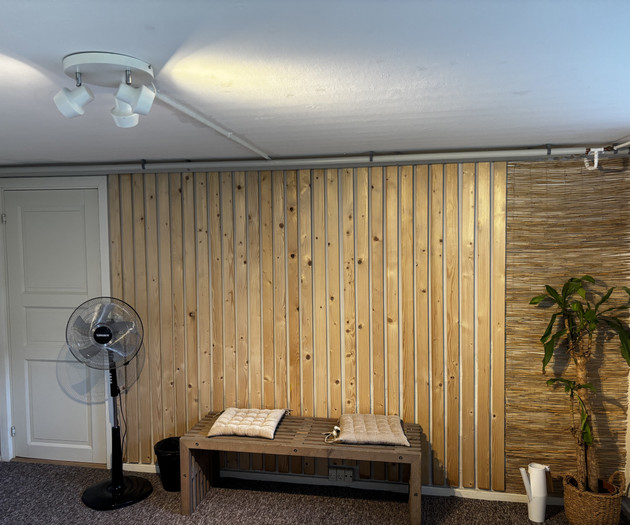Wooden accent wall with bench