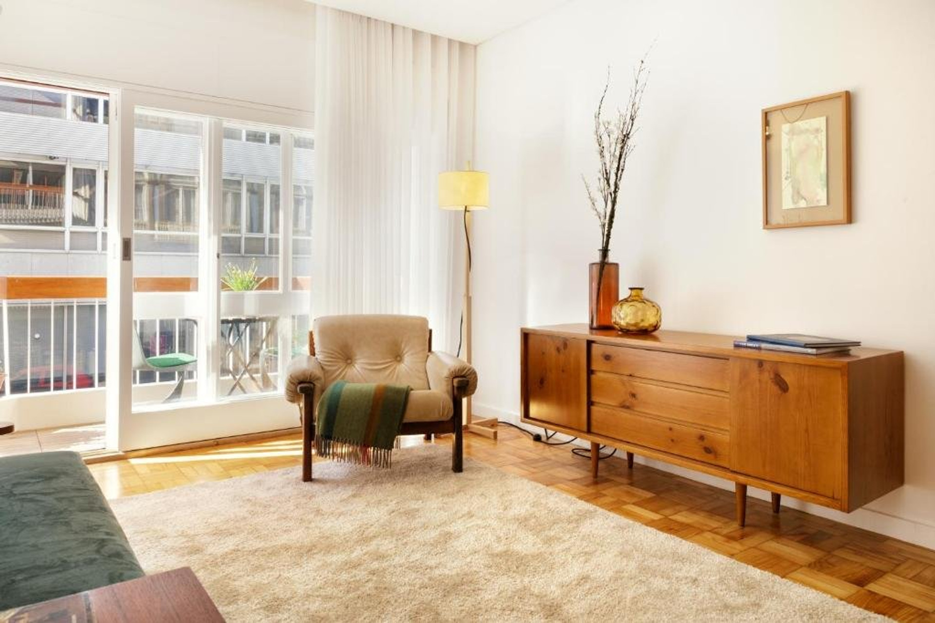 Sunny living room with balcony access