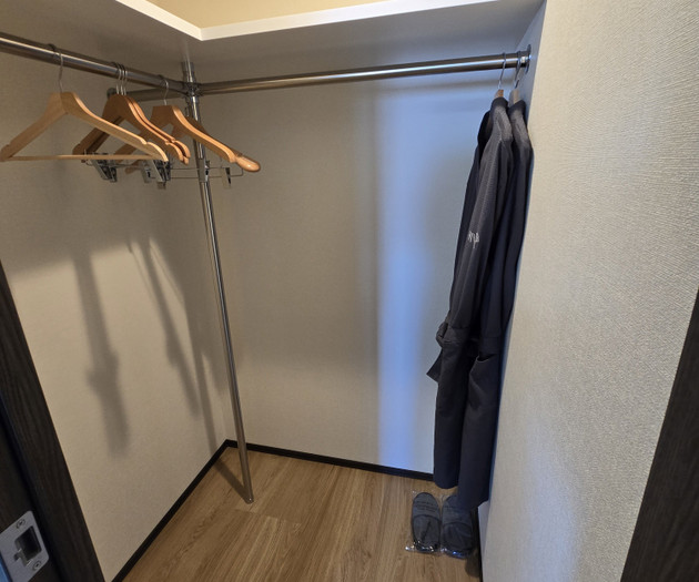 Closet with hangers umbrella