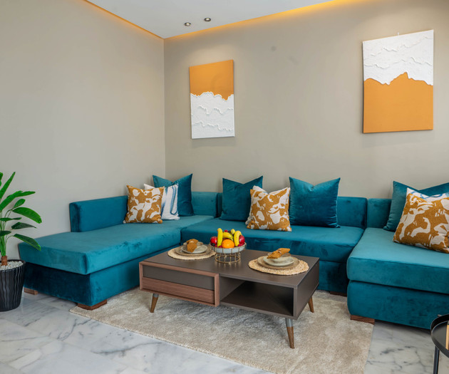 Teal sectional sofa living area
