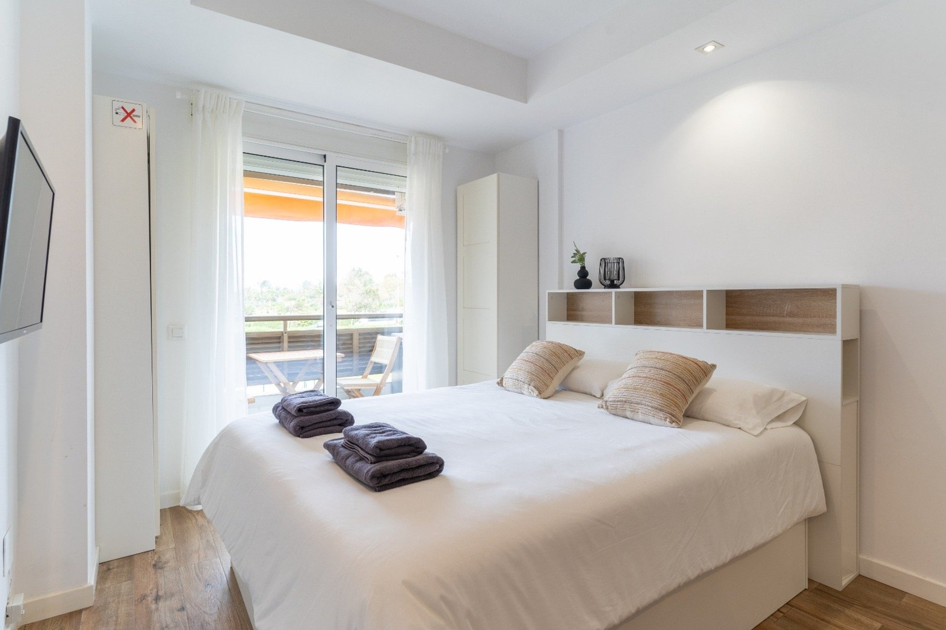 Bedroom with balcony access