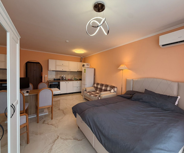 Light studio with balcony close to sea and center