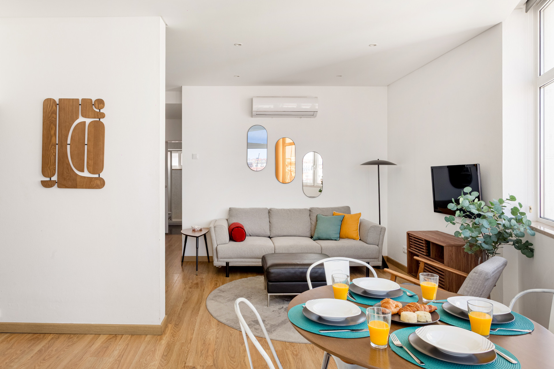 Living area with TV and Dining table.