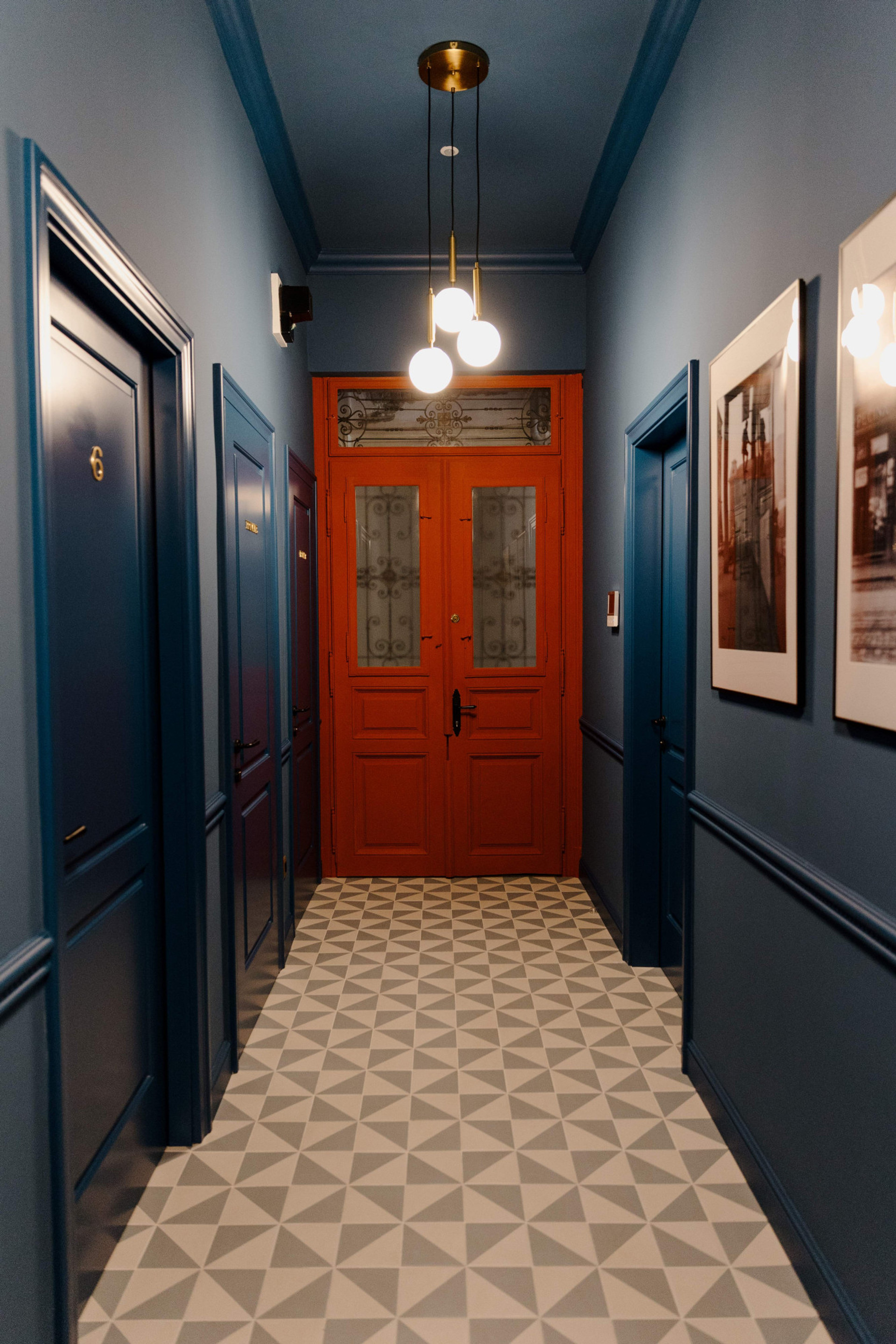 Hallway leading to entrance door