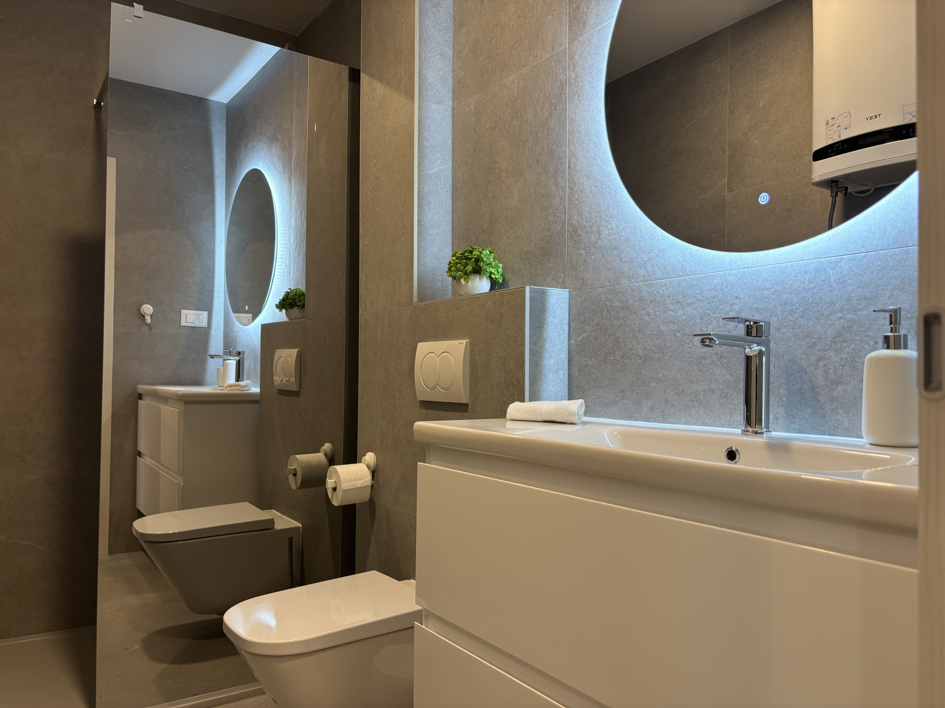 Modern bathroom with LED mirror