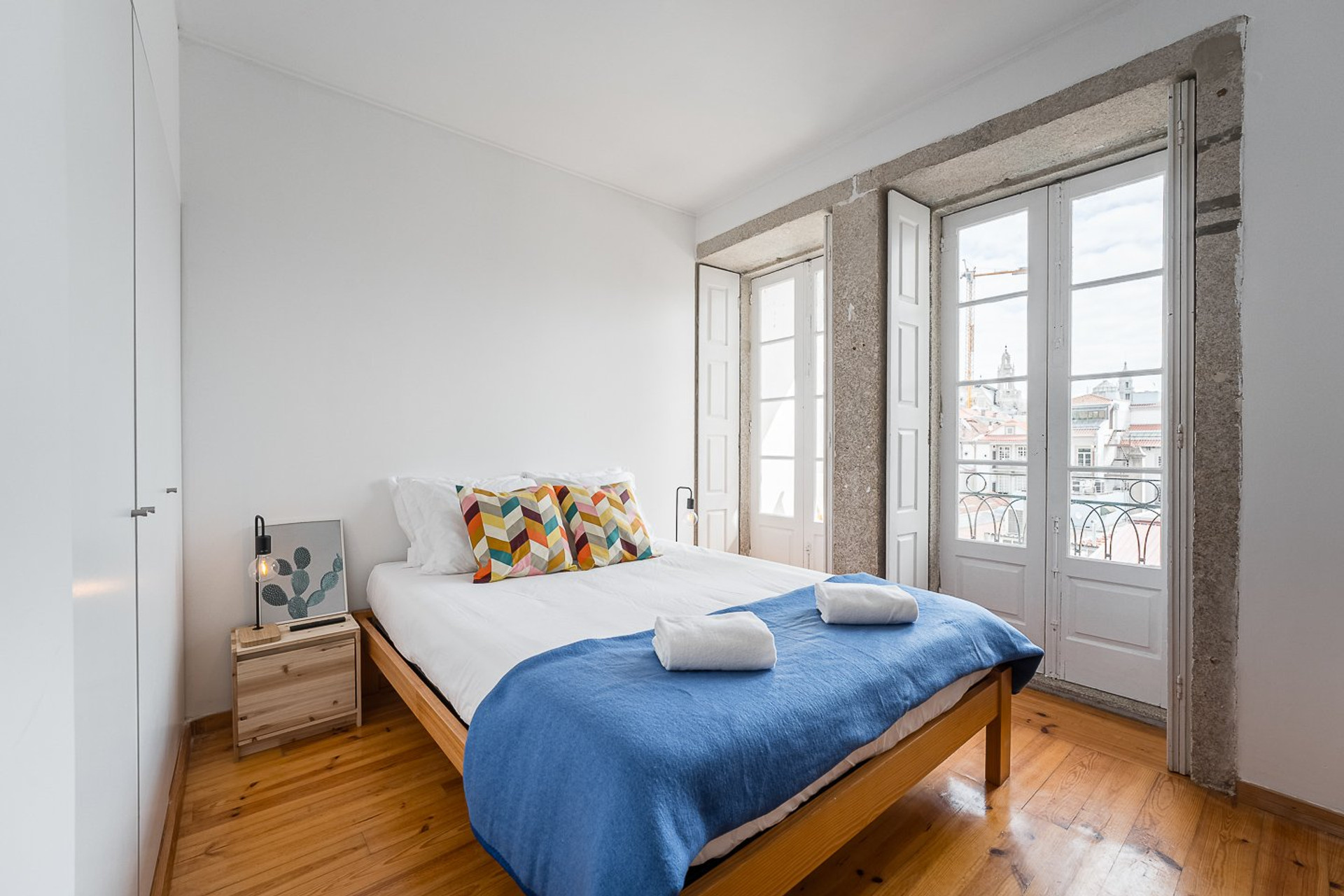Bright bedroom with balcony doors