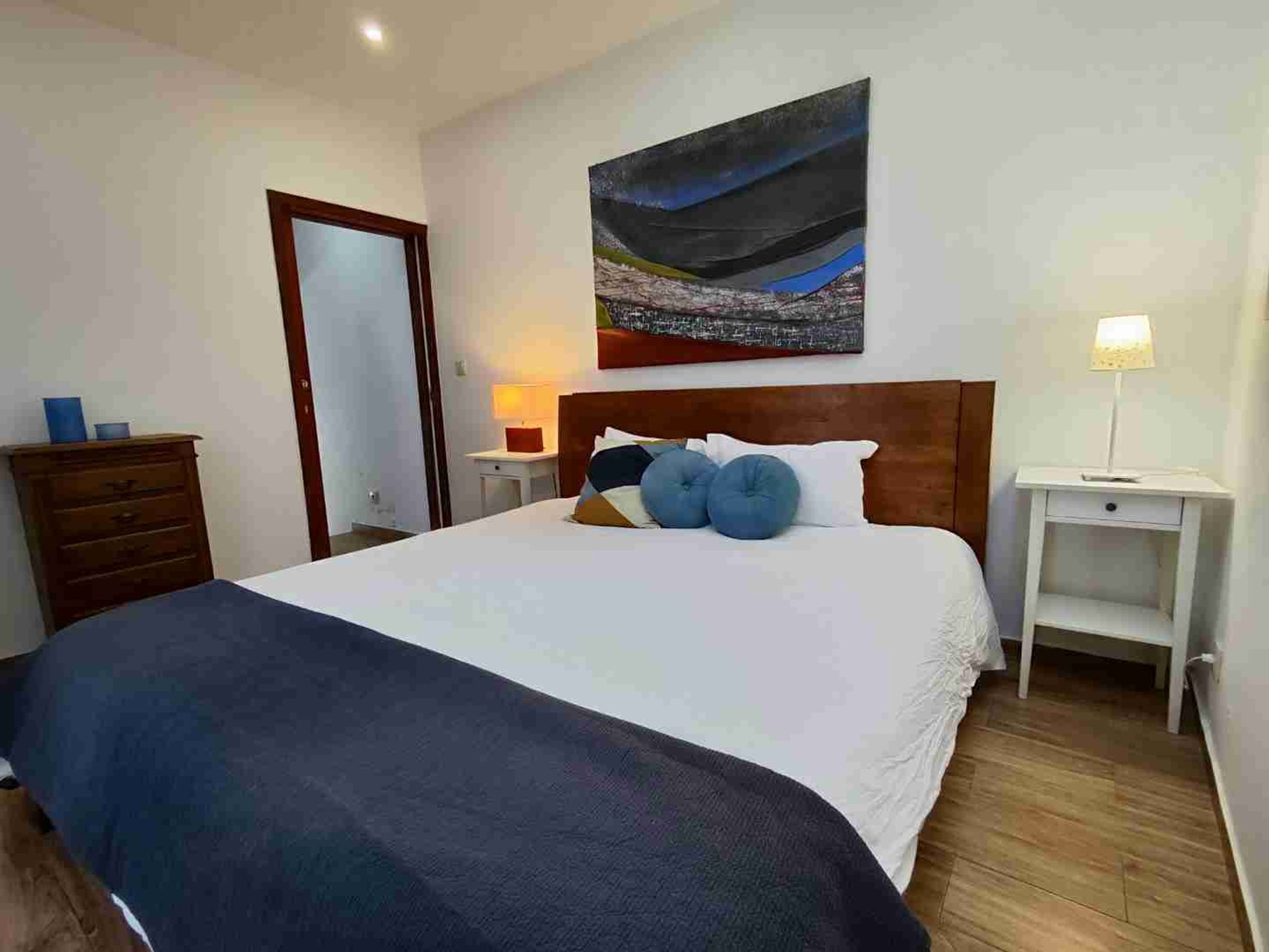 Cozy bedroom with wood headboard