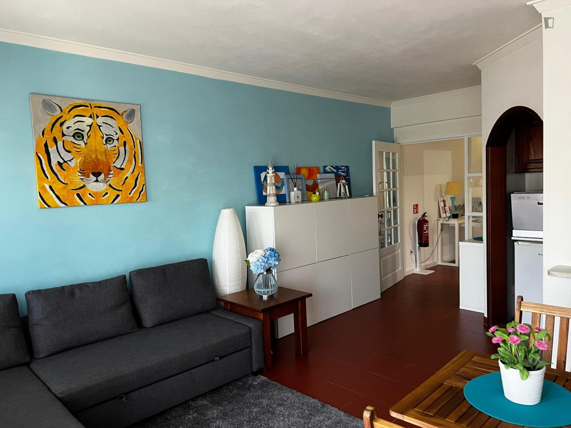 Living room with tiger artwork