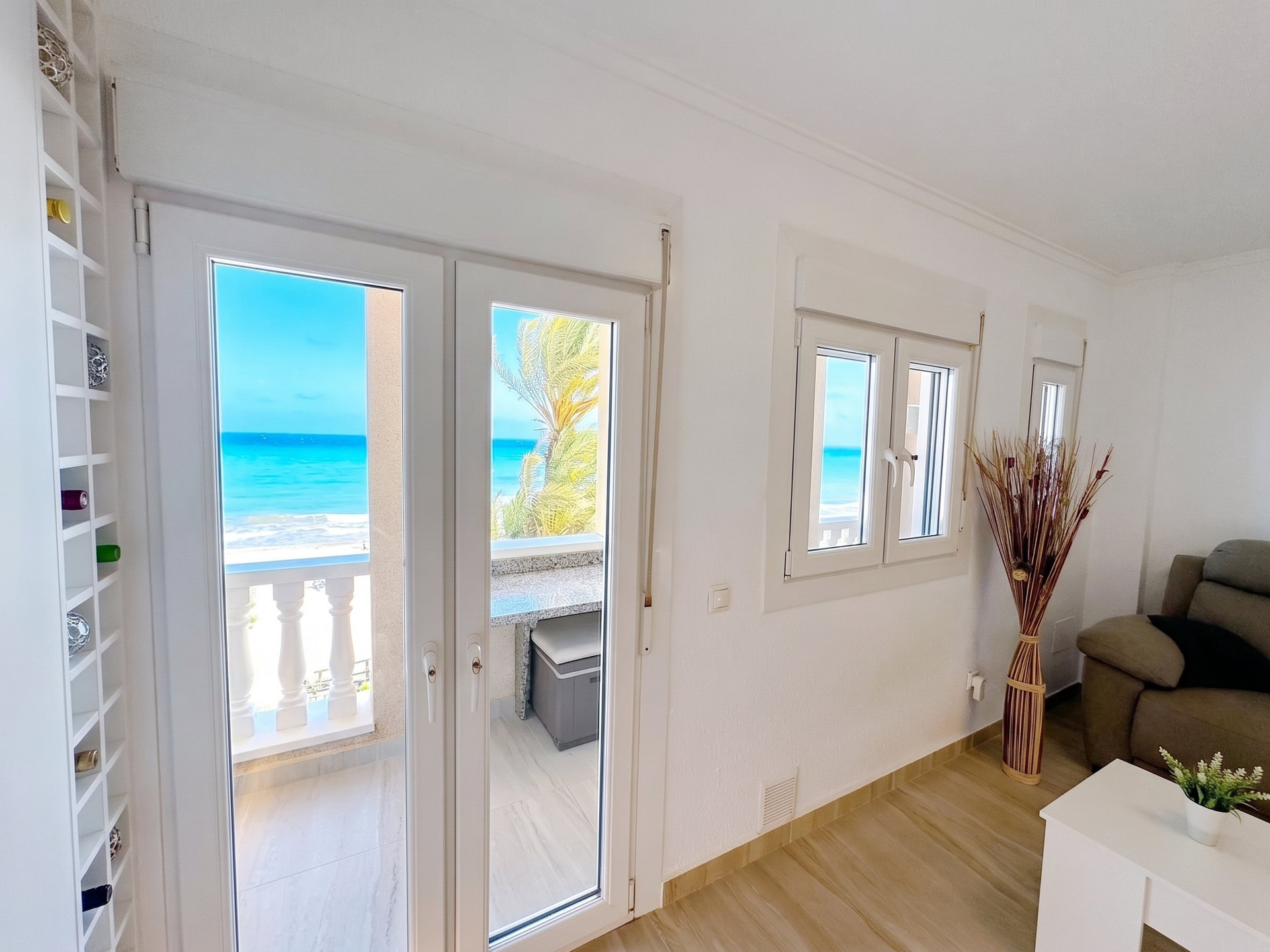Living room with balcony sea view