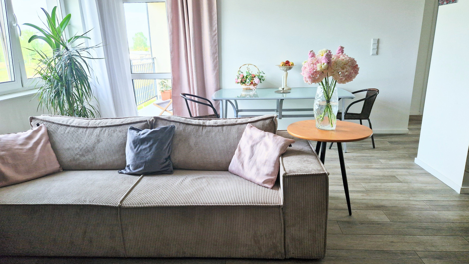 Bright living room sofa dining table