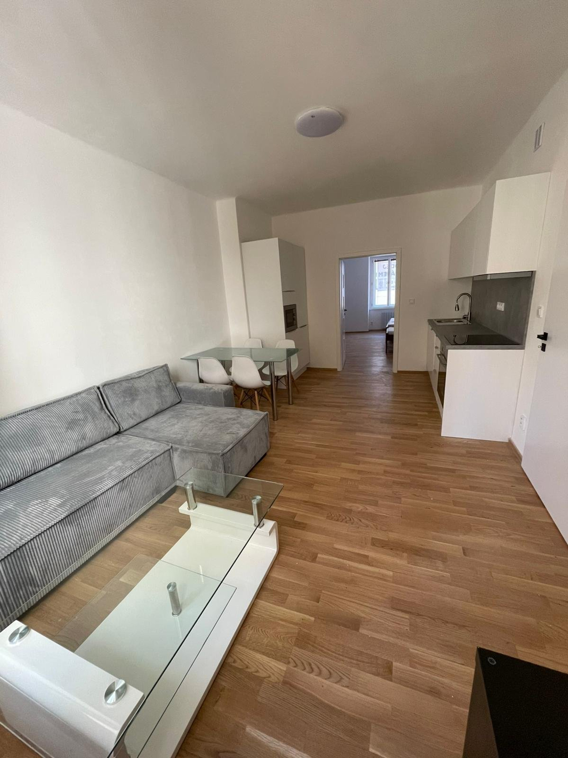 Spacious living room with kitchen