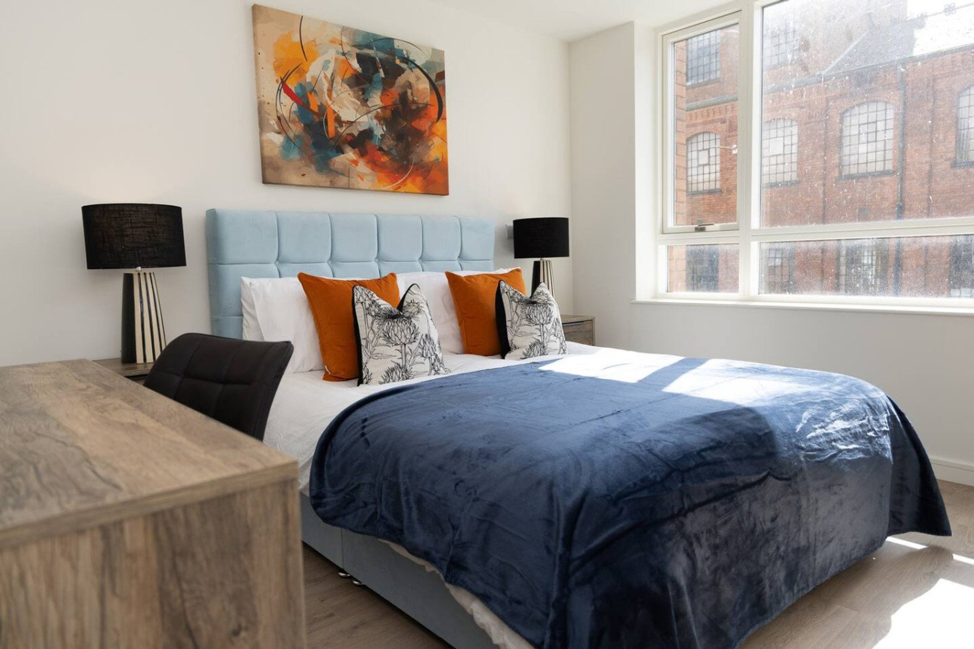 Bright bedroom with large window