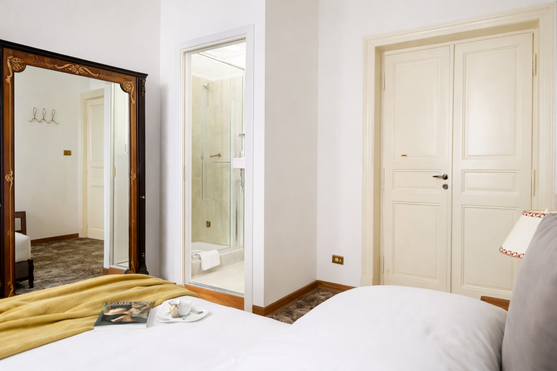 Bedroom with mirror and ensuite