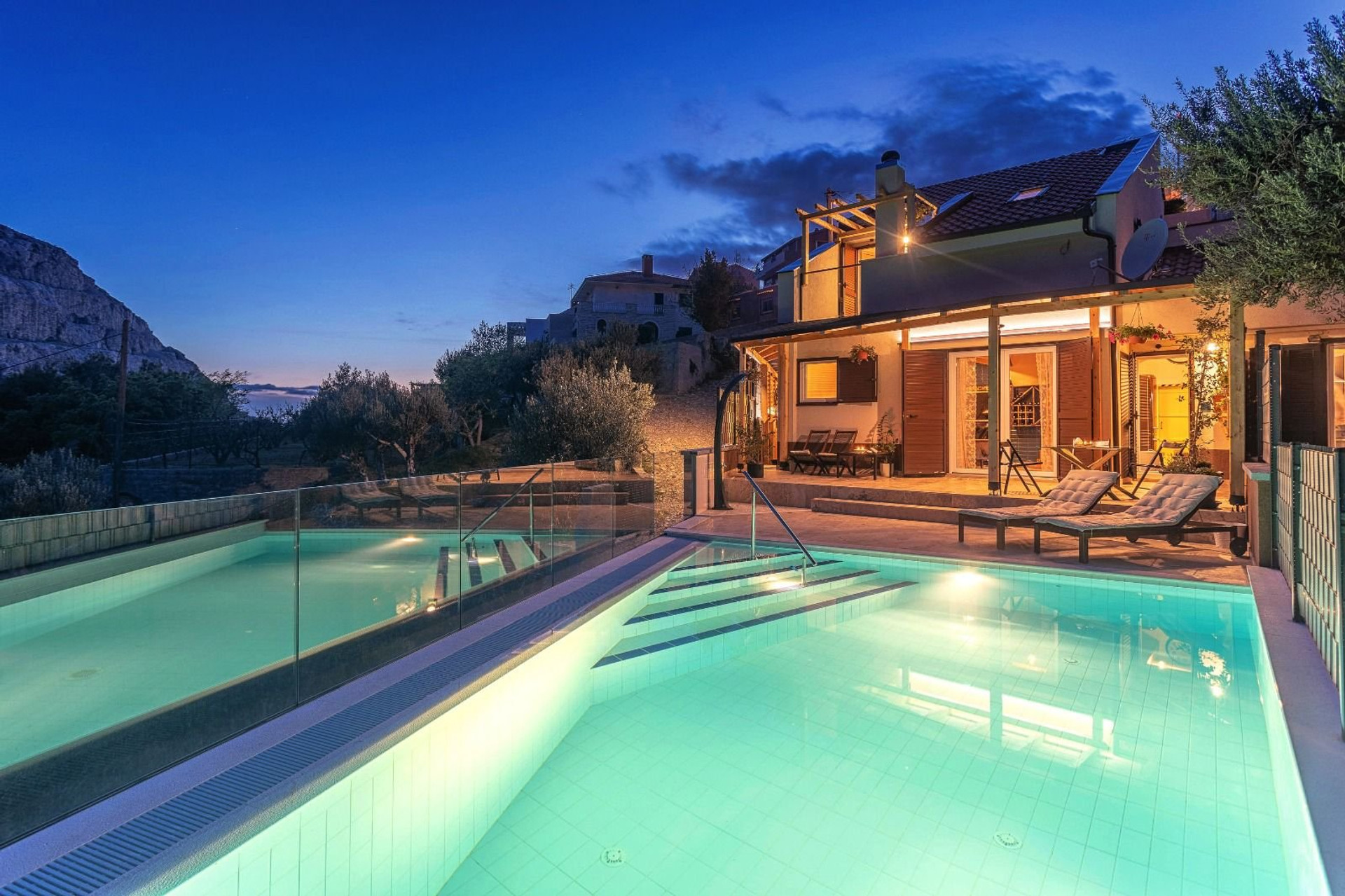 Villa with pool at twilight