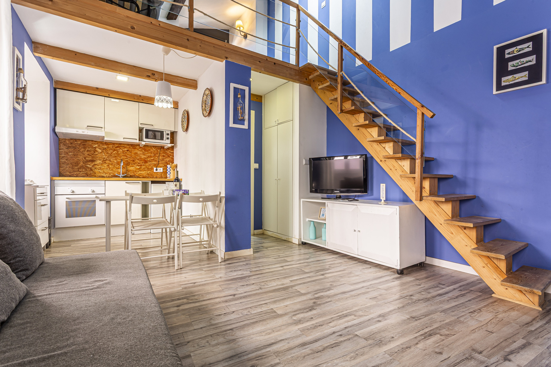 Open living, kitchen and stairs