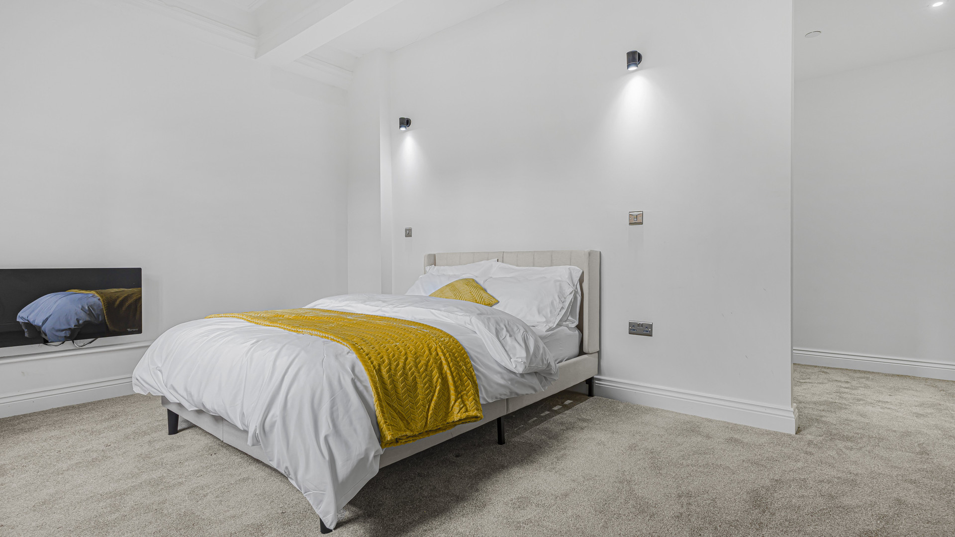 Bedroom with double bed wall lights