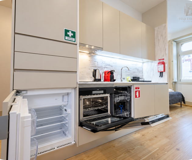 Kitchen appliances open, window view