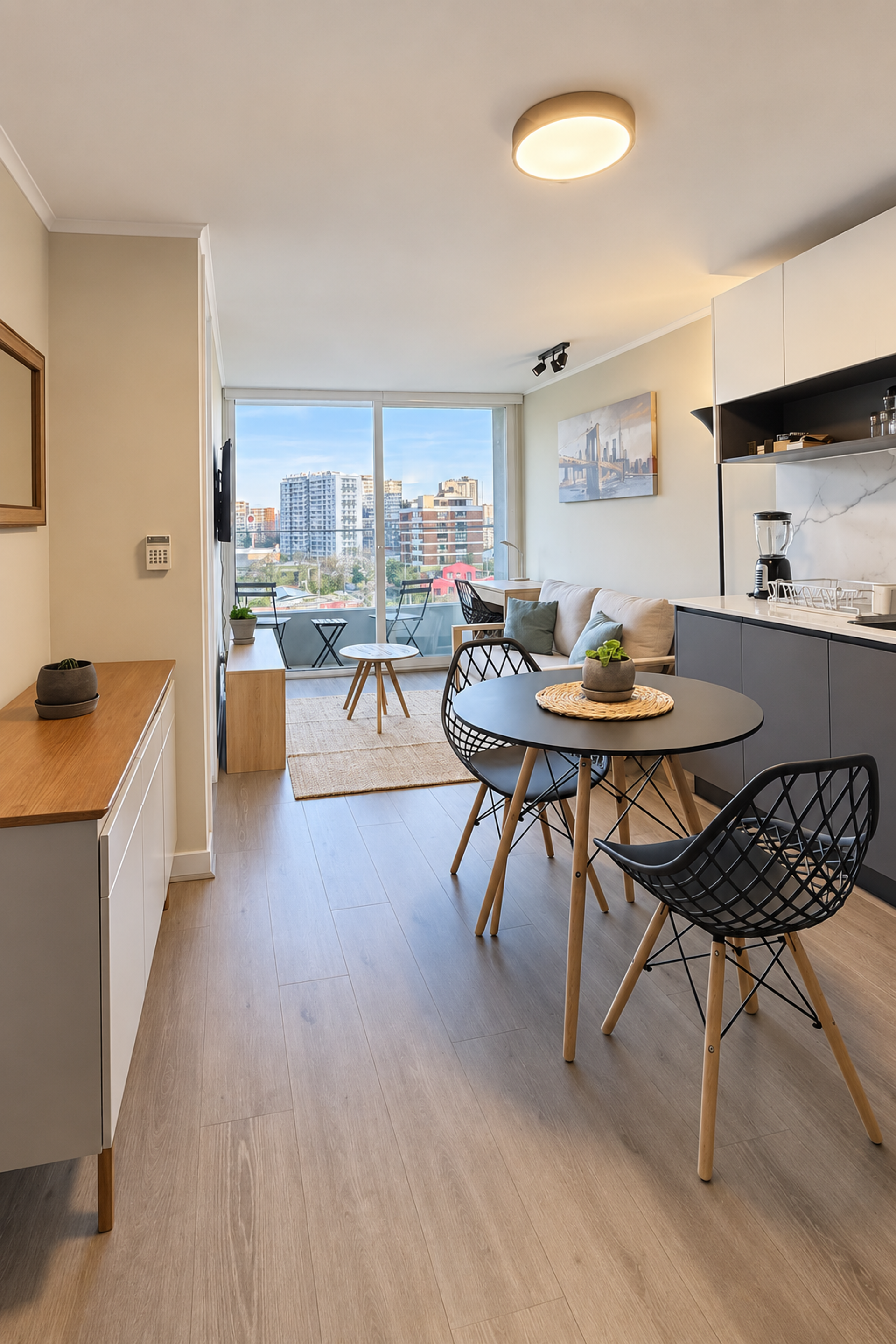 Open living, dining, kitchen with city view