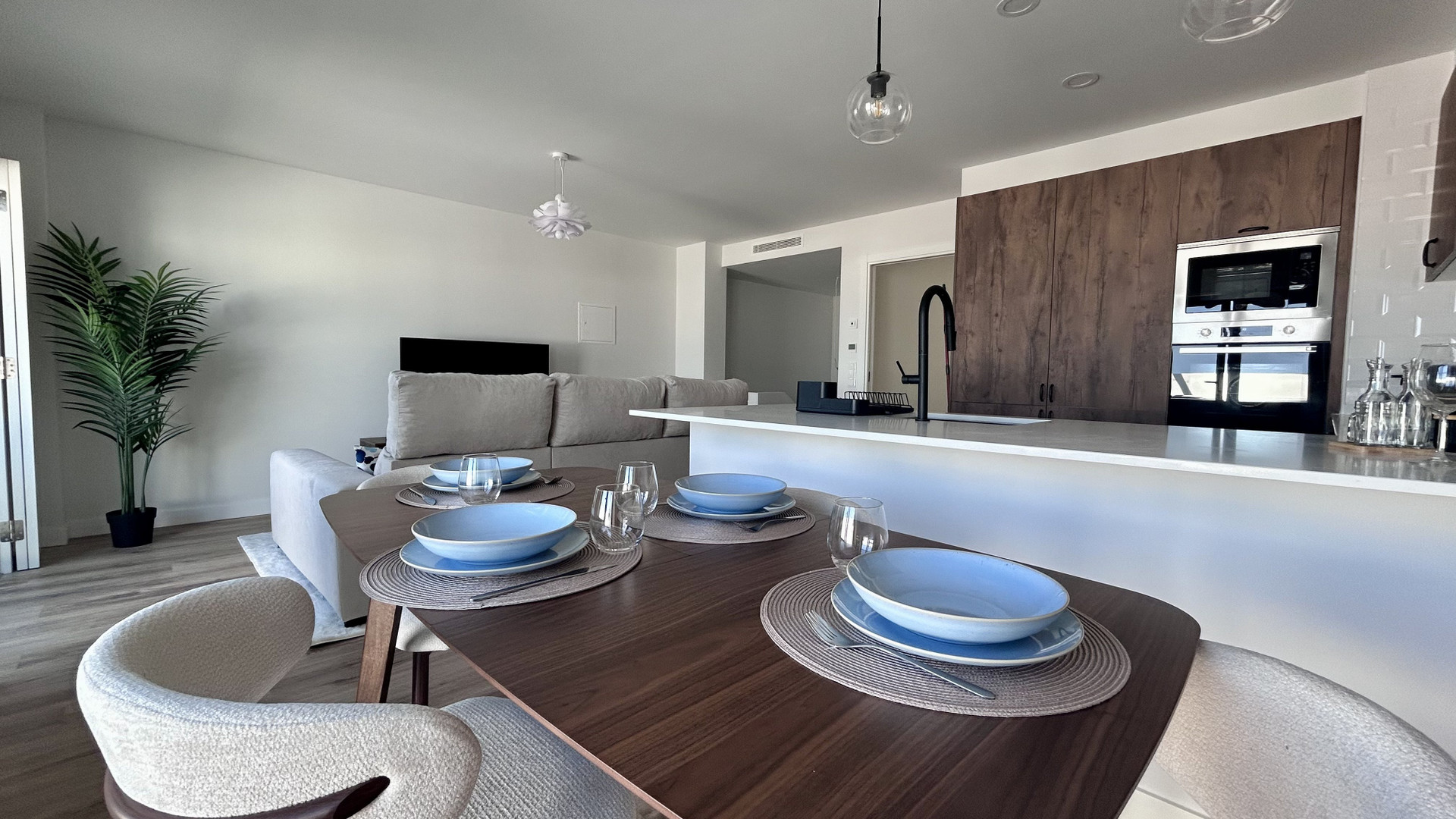 Dining area with kitchen and living room