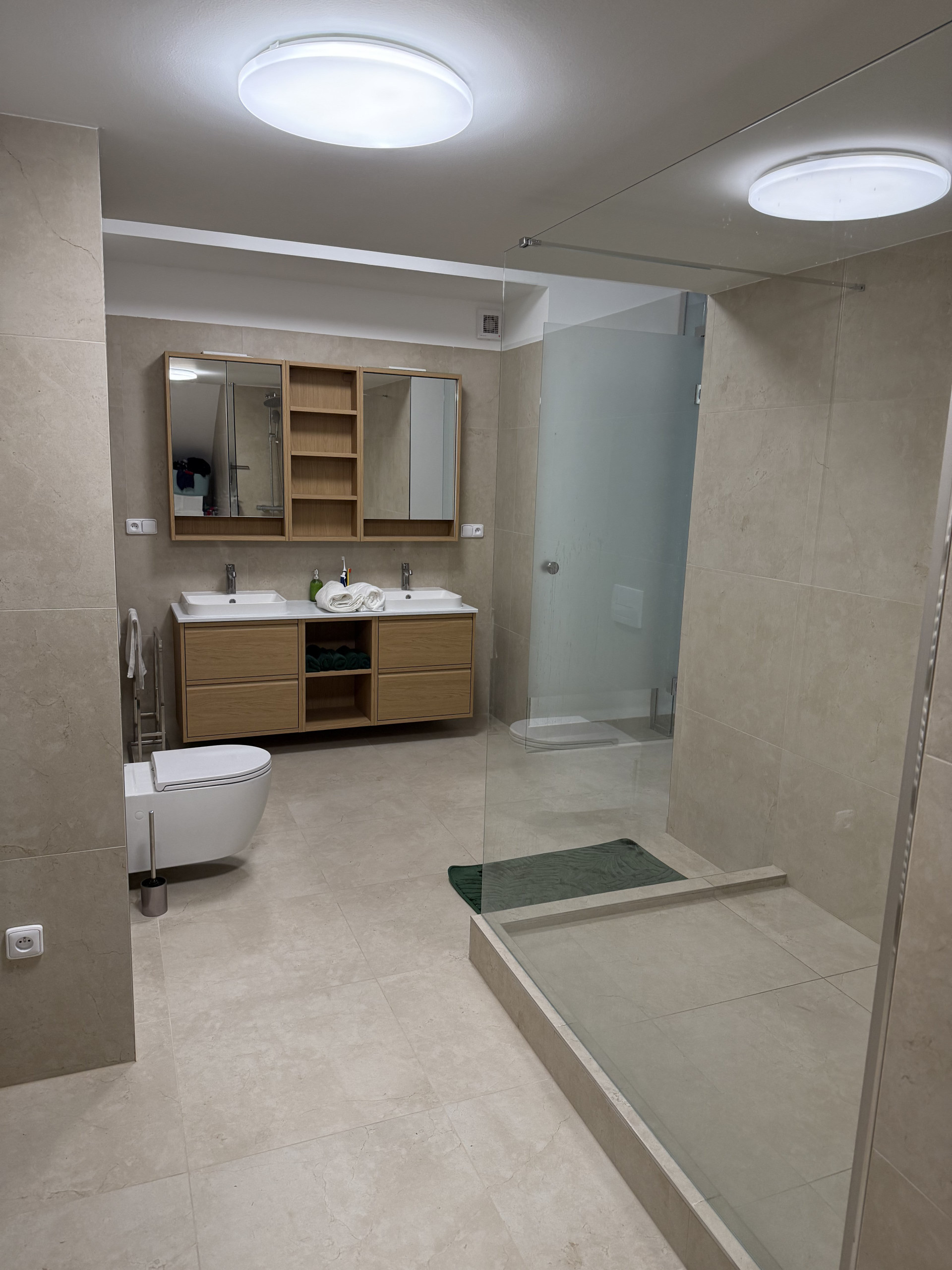 Bathroom with shower and storage