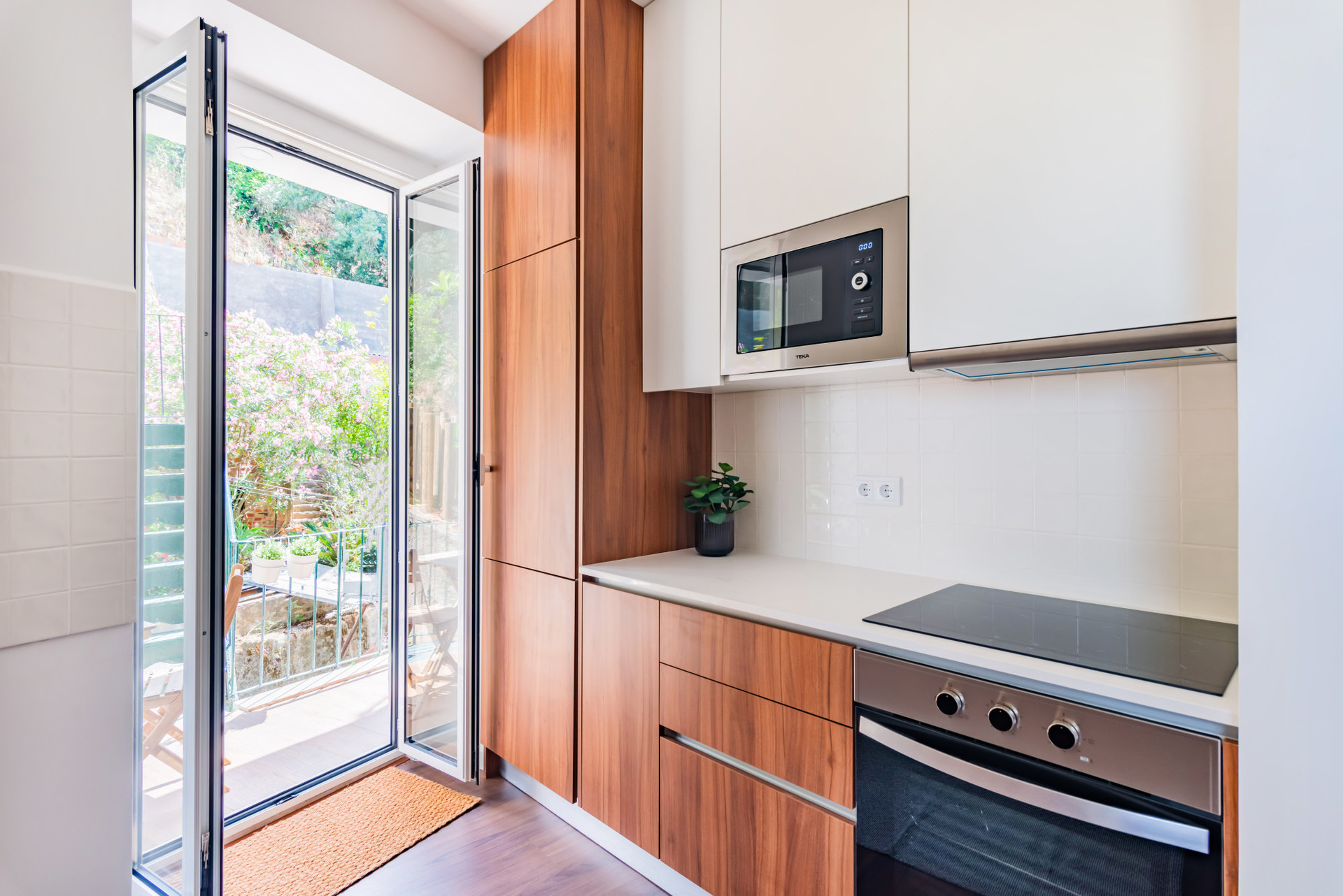 Fully Equipped Kitchen that opens up to the balcony
