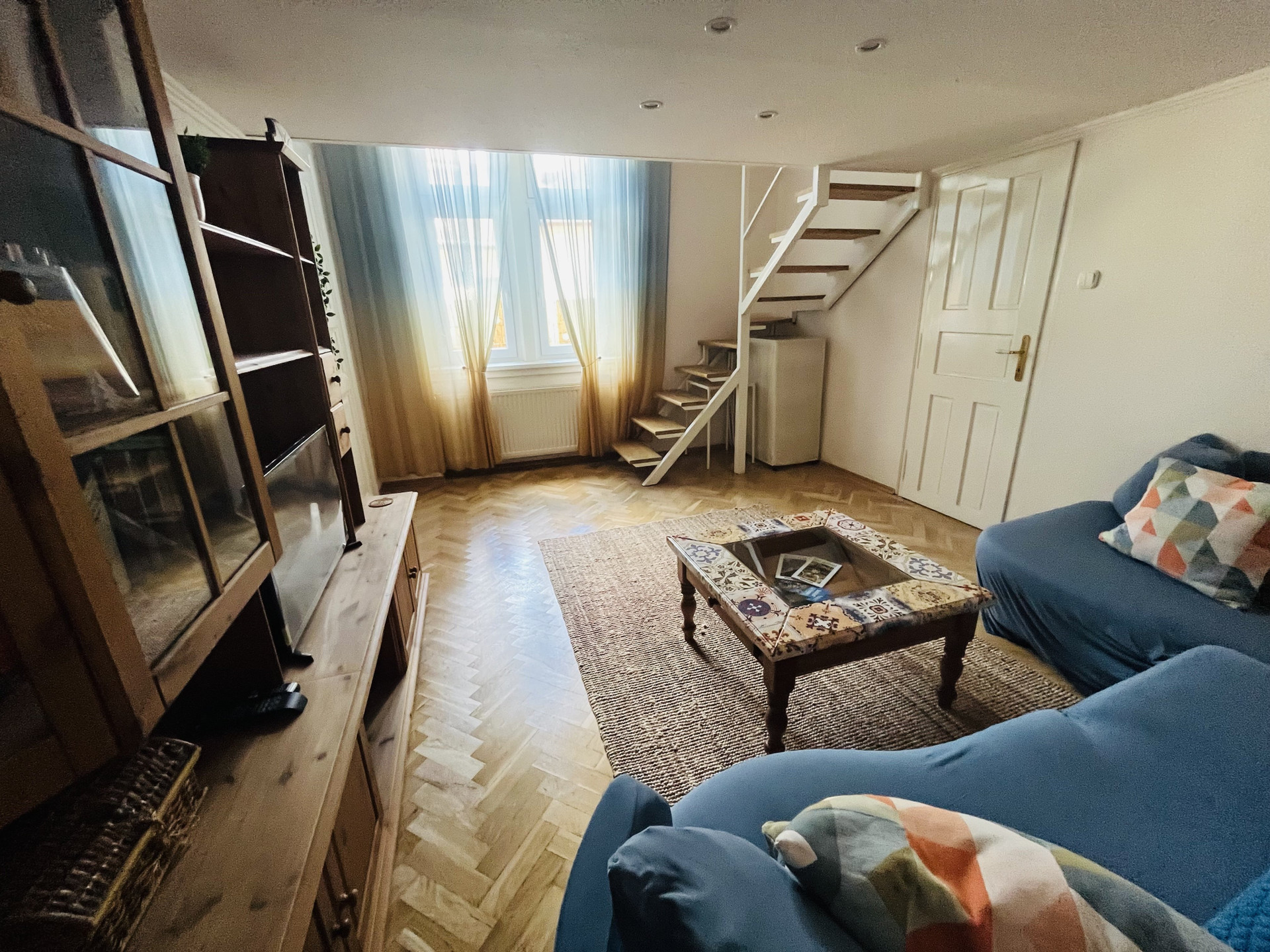 Cozy living room with staircase