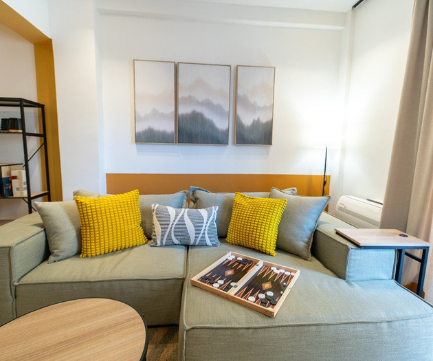 Living room seating with artwork